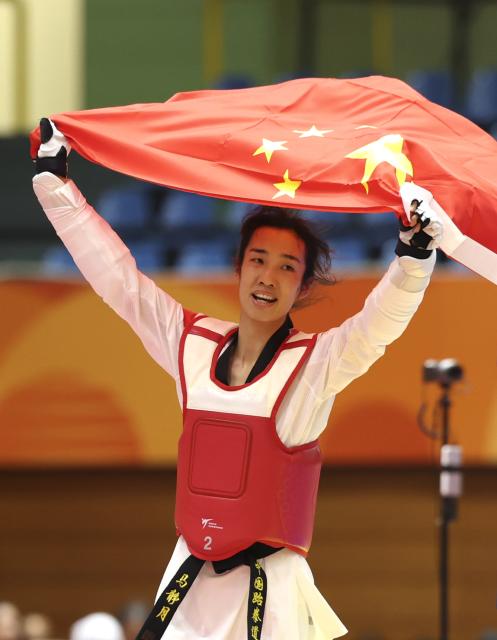 (261002) -- TOYOHASHI, Oct. 2, 2026 (Xinhua) -- Ma Jingyue of China celebrates victory after the women -49kg final of taekwondo at the 20th Asian Games Aichi-Nagoya 2026 in Toyohashi of Aichi Prefecture, Japan, Oct. 2, 2026. (Xinhua/Wang Fei)