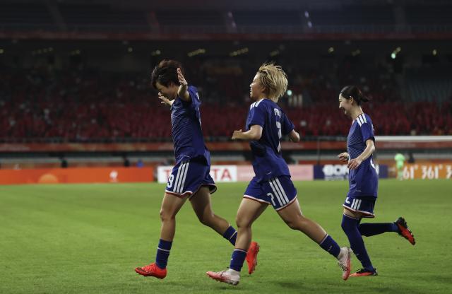 (261002) -- FUKUROI, Oct. 2, 2026 (Xinhua) -- Players of Japan celebrate scoring during the women's final match of football between Japan and the Democratic People's Republic of Korea (DPRK) at 20th Asian Games Aichi-Nagoya 2026 in Fukuroi of Shizuoka Prefecture, Japan, Oct. 2, 2026. (Xinhua/Jia Haocheng)