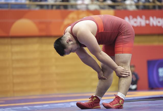 (261002) -- NAGOYA, Oct. 2, 2026 (Xinhua) -- Buheeerdun of China reacts after his match with Amir Hossein Zare of Iran during the men's freestyle 125kg final match of Wrestling at the 20th Asian Games Aichi-Nagoya 2026 in Nagoya, Japan, Oct. 2, 2026. (Xinhua/Long Lei)