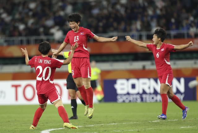(261002) -- FUKUROI, Oct. 2, 2026 (Xinhua) -- Jon Ryong Jong (C) of DPRK celebrates her goal during the women's final match of football between Japan and the Democratic People's Republic of Korea (DPRK) at 20th Asian Games Aichi-Nagoya 2026 in Fukuroi of Shizuoka Prefecture, Japan, Oct. 2, 2026. (Xinhua/Jia Haocheng)