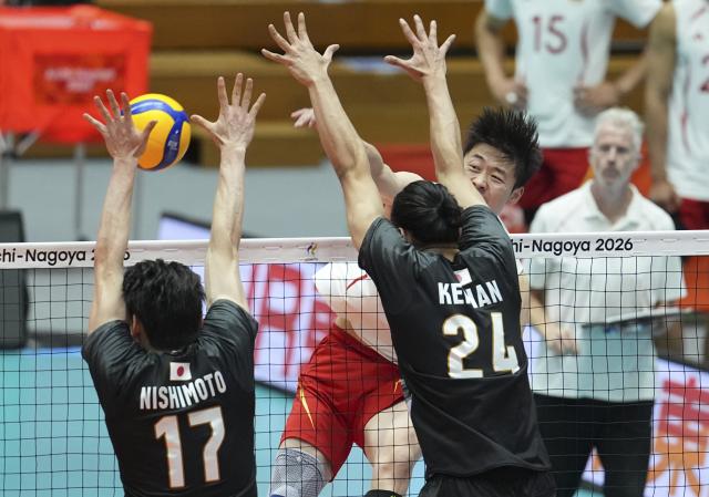 (261002) -- OKAZAKI, Oct. 2, 2026 (Xinhua) -- Wang Bin (3rd L) of China spikes the ball during the men's volleyball semifinal match between China and Japan at the 20th Asian Games Aichi-Nagoya 2026 in Okazaki of Aichi Prefecture, Japan, Oct. 2, 2026. (Xinhua/Cheong Kam Ka)