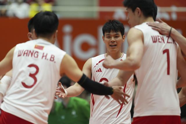 (261002) -- OKAZAKI, Oct. 2, 2026 (Xinhua) -- Players of China celebrate scoring during the men's volleyball semifinal match between China and Japan at the 20th Asian Games Aichi-Nagoya 2026 in Okazaki of Aichi Prefecture, Japan, Oct. 2, 2026. (Xinhua/Cheong Kam Ka)