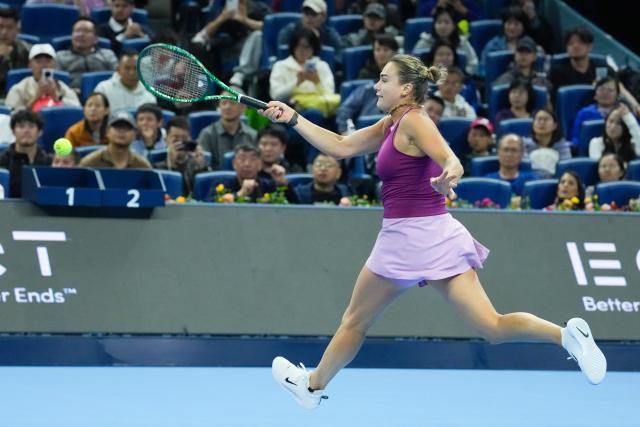 (261002) -- BEIJING, Oct. 2, 2026 (Xinhua) -- Aryna Sabalenka of Belarus hits a return during the women's singles second round match against Renata Zarazua of Mexico at 2026 China Open tennis tournament in Beijing, China, Oct. 2, 2026. (Xinhua/Ju Huanzong)