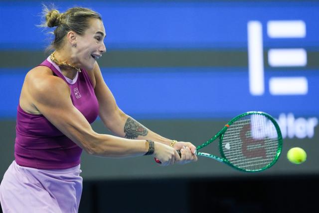 (261002) -- BEIJING, Oct. 2, 2026 (Xinhua) -- Aryna Sabalenka of Belarus hits a return during the women's singles second round match against Renata Zarazua of Mexico at 2026 China Open tennis tournament in Beijing, China, Oct. 2, 2026. (Xinhua/Ju Huanzong)