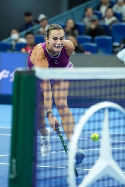 (261002) -- BEIJING, Oct. 2, 2026 (Xinhua) -- Aryna Sabalenka of Belarus hits a return during the women's singles second round match against Renata Zarazua of Mexico at 2026 China Open tennis tournament in Beijing, China, Oct. 2, 2026. (Xinhua/Ju Huanzong)