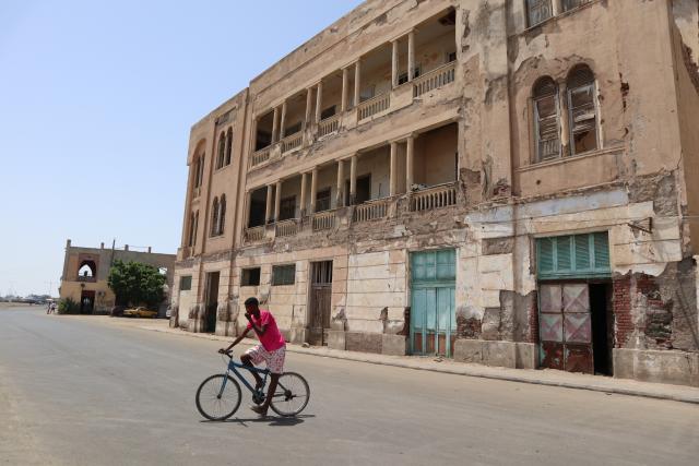 (261002) -- ADDIS ABABA, Oct. 2, 2026 (Xinhua) -- This photo taken on June 7, 2025 shows a man riding past a building at the old city of Massawa, Eritrea. The African Union (AU) has called on Ethiopia, Eritrea and Egypt to exercise "maximum restraint," urging the three countries to de-escalate the situation amid mounting regional diplomatic tensions.
   TO GO WITH "Roundup: AU urges Ethiopia, Eritrea, Egypt to de-escalate tensions amid diplomatic rift" (Xinhua/Liu Fangqiang)