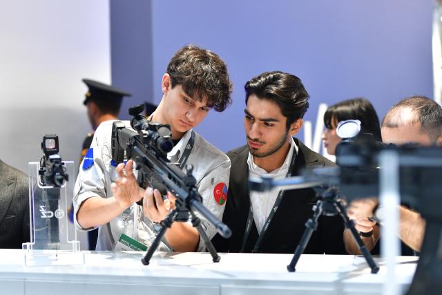 (261003) -- BEIJING, Oct. 3, 2026 (Xinhua) -- People visit the Azerbaijan International Defence Exhibition at the Baku Expo Center in Baku, Azerbaijan, Oct. 1, 2026.
  The 6th Azerbaijan International Defence Exhibition is held here from Sept. 30 to Oct. 2. (Xinhua/Chen Junfeng)
