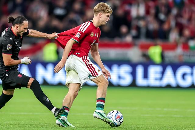 (261003) -- BUDAPEST, Oct. 3, 2026 (Xinhua) -- Andras Schafer (R) of Hungary dribbles the ball during the UEFA Nations League 2026/27 League B Group B2 match between Hungary and Georgia in Budapest, Hungary, Oct. 2, 2026. (Photo by David Balogh/Xinhua)