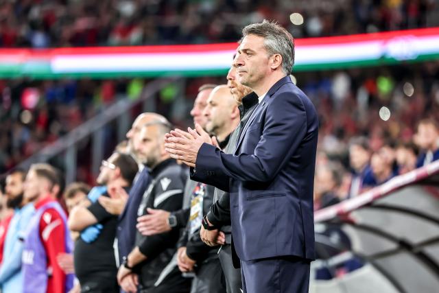 (261003) -- BUDAPEST, Oct. 3, 2026 (Xinhua) -- Ramaz Svanadze (1st R), head coach of Georgia, reacts before the UEFA Nations League 2026/27 League B Group B2 match between Hungary and Georgia in Budapest, Hungary, Oct. 2, 2026. (Photo by David Balogh/Xinhua)