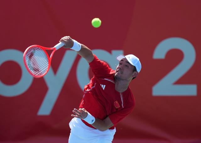 (261003) -- NAGOYA, Oct. 3, 2026 (Xinhua) -- Wu Yibing of China serves during the Men's Singles Gold Medal Match of Tennis between Wu Yibing of China and Wong Coleman of Hong Kong, China at the 20th Asian Games Aichi-Nagoya 2026 in Nagoya, Japan, Oct. 3, 2026. (Xinhua/Chen Zeguo)
