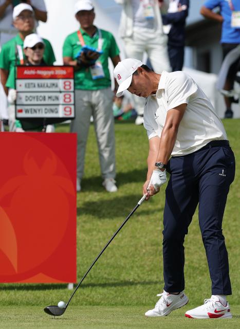(261003) -- , Oct. 3, 2026 (Xinhua) -- Ding Wenyi of China tees off during the Men's Individual Stroke Play Round 4 of Golf at 20th Asian Games Aichi-Nagoya 2026 in Kasugai of Aichi Prefecture, Japan, Oct. 3, 2026. (Xinhua/Li Bo)