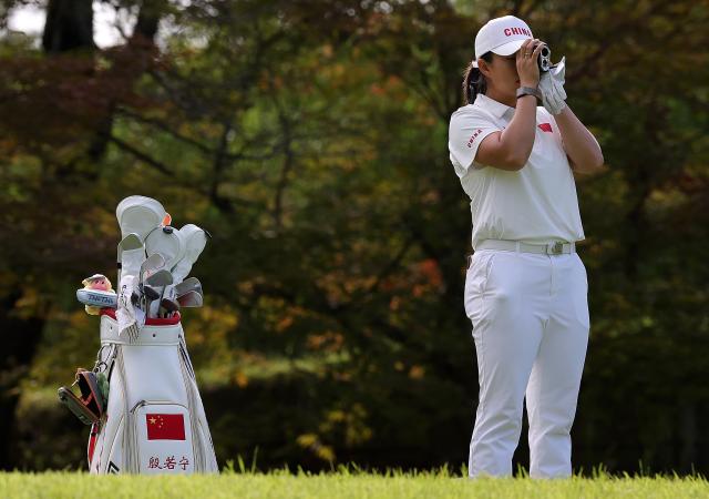 (261003) -- KASUGAI, Oct. 3, 2026 (Xinhua) -- Yin Ruoning of China uses a rangefinder during the Women's Individual Stroke Play Round 4 of Golf at 20th Asian Games Aichi-Nagoya 2026 in Kasugai of Aichi Prefecture, Japan, Oct. 3, 2026. (Xinhua/Li Bo)