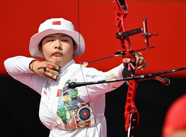 (261003) -- OKAZAKI, Oct. 3, 2026 (Xinhua) -- Huang Yuwei of China competes during the Recurve Women's Individual Bronze Medal Match of Archery against Zhu Jingyi of China at the 20th Asian Games Aichi-Nagoya 2026 in Okazaki of Aichi Prefecture, Japan, Oct. 3, 2026. (Xinhua/Yu Yang)