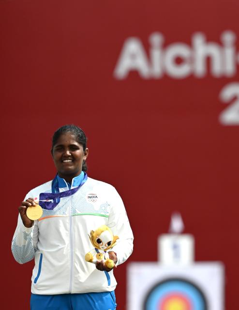 (261003) -- OKAZAKI, Oct. 3, 2026 (Xinhua) -- Gold medalist Kumkum Anil Mohod of India reacts during the victory ceremony for the Recurve Women's Individual of Archery at the 20th Asian Games Aichi-Nagoya 2026 in Okazaki of Aichi Prefecture, Japan, Oct. 3, 2026. (Xinhua/Yu Yang)