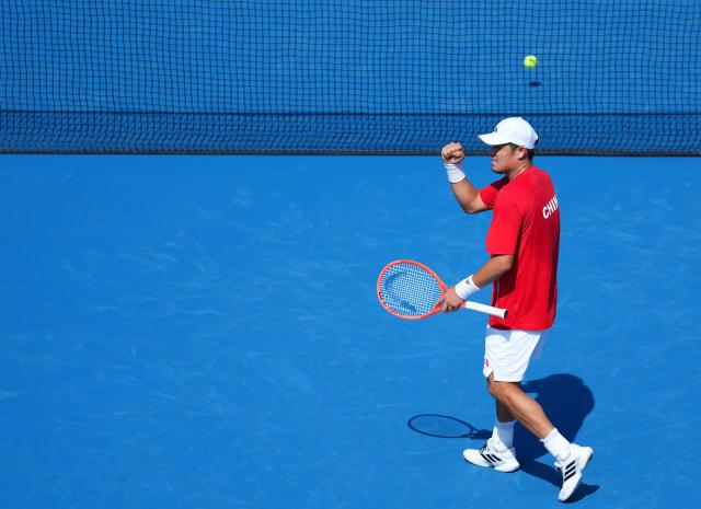 (261003) -- NAGOYA, Oct. 3, 2026 (Xinhua) -- Wu Yibing of China celebrates during the Men's Singles Gold Medal Match of Tennis between Wu Yibing of China and Wong Coleman of Hong Kong, China at the 20th Asian Games Aichi-Nagoya 2026 in Nagoya, Japan, Oct. 3, 2026. (Xinhua/Chen Zeguo)