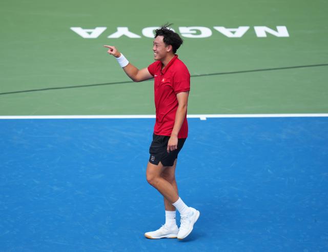 (261003) -- NAGOYA, Oct. 3, 2026 (Xinhua) -- Wong Coleman celebrates after the Men's Singles Gold Medal Match of Tennis between Wu Yibing of China and Wong Coleman of Hong Kong, China at the 20th Asian Games Aichi-Nagoya 2026 in Nagoya, Japan, Oct. 3, 2026. (Xinhua/Chen Zeguo)