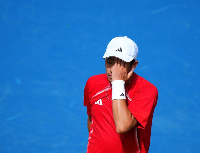 (261003) -- NAGOYA, Oct. 3, 2026 (Xinhua) -- Wu Yibing of China reacts during the Men's Singles Gold Medal Match of Tennis between Wu Yibing of China and Wong Coleman of Hong Kong, China at the 20th Asian Games Aichi-Nagoya 2026 in Nagoya, Japan, Oct. 3, 2026. (Xinhua/Chen Zeguo)