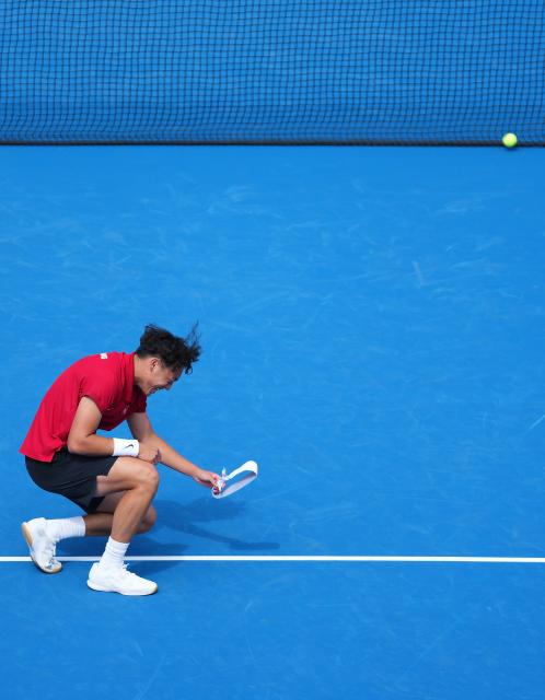 (261003) -- NAGOYA, Oct. 3, 2026 (Xinhua) -- Wong Coleman celebrates after the Men's Singles Gold Medal Match of Tennis between Wu Yibing of China and Wong Coleman of Hong Kong, China at the 20th Asian Games Aichi-Nagoya 2026 in Nagoya, Japan, Oct. 3, 2026. (Xinhua/Chen Zeguo)