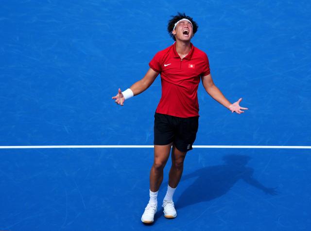 (261003) -- NAGOYA, Oct. 3, 2026 (Xinhua) -- Wong Coleman celebrates after the Men's Singles Gold Medal Match of Tennis between Wu Yibing of China and Wong Coleman of Hong Kong, China at the 20th Asian Games Aichi-Nagoya 2026 in Nagoya, Japan, Oct. 3, 2026. (Xinhua/Chen Zeguo)