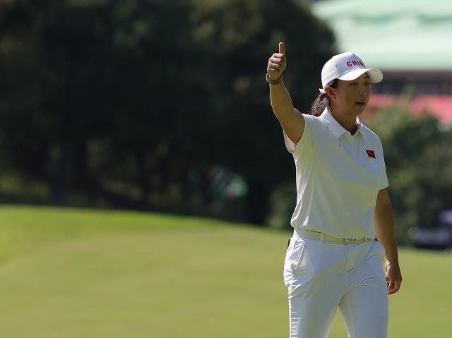 (261003) -- KASUGAI, Oct. 3, 2026 (Xinhua) -- Yin Ruoning of China celebrates during the Women's Individual Stroke Play Round 4 of Golf at 20th Asian Games Aichi-Nagoya 2026 in Kasugai of Aichi Prefecture, Japan, Oct. 3, 2026. (Xinhua/Li Bo)