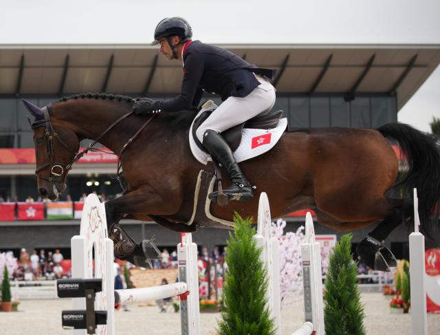 (261003) -- TOKYO, Oct. 3, 2026 (Xinhua) -- Lam Patrick of China's Hong Kong competes during the jumping Ind B (up to 1.55m) 1st round of equestrian at the 20th Asian Games Aichi-Nagoya 2026 in Tokyo, Japan, Oct. 3, 2026. (Photo by Wang Shen/Xinhua)