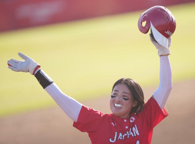 (261003) -- ANJO, Oct. 3, 2026 (Xinhua) -- Suto Shiho of Japan celebrates winning the women's gold medal match of softball between China and Japan at the 20th Asian Games Aichi-Nagoya 2026 in Anjo of Aichi Prefecture, Japan, Oct. 3, 2026. (Xinhua/Luo Yuan)
