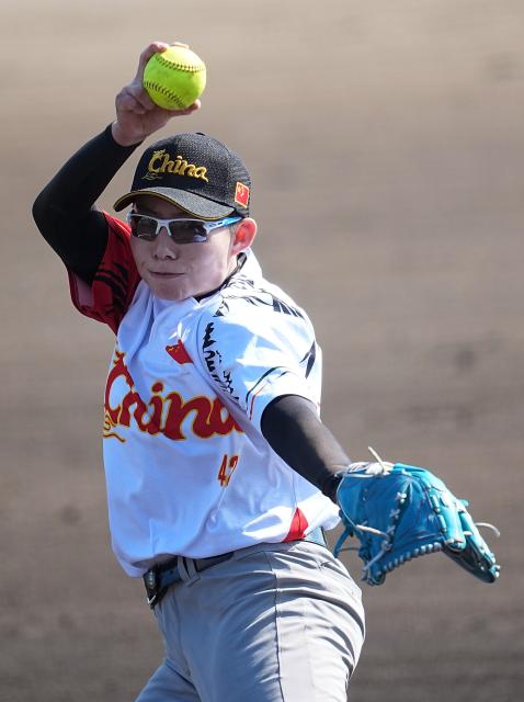 (261003) -- ANJO, Oct. 3, 2026 (Xinhua) -- Chai Yinan of China throws the ball during the women's gold medal match of softball between China and Japan at the 20th Asian Games Aichi-Nagoya 2026 in Anjo of Aichi Prefecture, Japan, Oct. 3, 2026. (Xinhua/Luo Yuan)