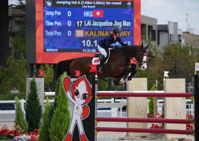 (261003) -- TOKYO, Oct. 3, 2026 (Xinhua) -- Lai Jacqueline Jing Man of China's Hong Kong competes during the jumping Ind A (1.45m-1.50m) 1st round of equestrian at the 20th Asian Games Aichi-Nagoya 2026 in Tokyo, Japan, Oct. 3, 2026. (Photo by Wang Shen/Xinhua)