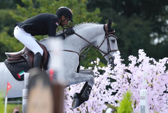 (261003) -- TOKYO, Oct. 3, 2026 (Xinhua) -- Humaid Almheiri of the United Arab Emirates competes during the jumping Ind A (1.45m-1.50m) 1st round of equestrian at the 20th Asian Games Aichi-Nagoya 2026 in Tokyo, Japan, Oct. 3, 2026. (Photo by Wang Shen/Xinhua)