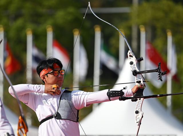 (261003) -- OKAZAKI, Oct. 3, 2026 (Xinhua) -- Lee Wooseok of South Korea competes during the Recurve Men's Individual Gold Medal Match of Archery against Nakanishi Junya of Japan at the 20th Asian Games Aichi-Nagoya 2026 in Okazaki of Aichi Prefecture, Japan, Oct. 3, 2026. (Xinhua/Yu Yang)