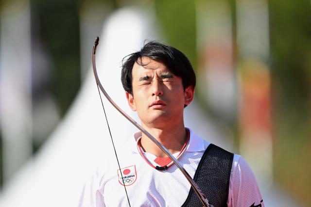 (261003) -- OKAZAKI, Oct. 3, 2026 (Xinhua) -- Nakanishi Junya of Japan reacts during the Recurve Men's Individual Gold Medal Match of Archery against Lee Wooseok of South Korea at the 20th Asian Games Aichi-Nagoya 2026 in Okazaki of Aichi Prefecture, Japan, Oct. 3, 2026. (Xinhua/Yu Yang)