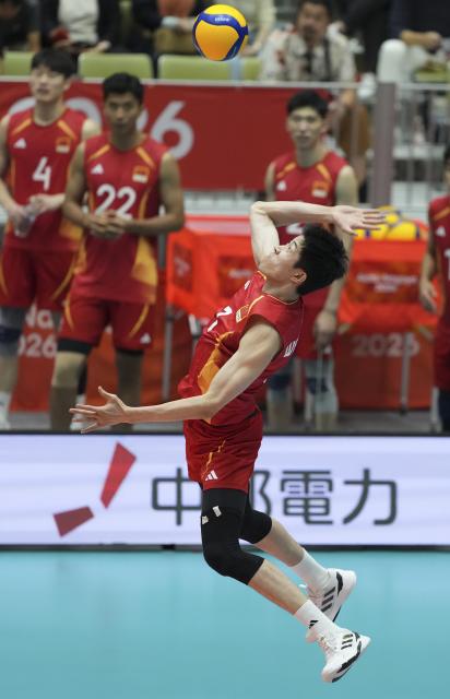 (261003) -- OKAZAKI, Oct. 3, 2026 (Xinhua) -- Wen Zihua of China serves during the men's volleyball bronze medal match between China and Pakistan at the 20th Asian Games Aichi-Nagoya 2026 in Okazaki of Aichi Prefecture, Japan, Oct. 3, 2026. (Xinhua/Jia Yuchen)