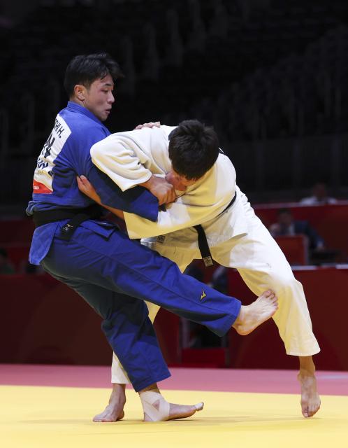 (261003) -- NAGOYA, Oct. 3, 2026 (Xinhua) -- Tokumochi Hidetoshi (L) of team Japan competes with Aidar Arapov of team Kazakhstan during the mixed team final of judo between Japan and Kazakhstan at the 20th Asian Games Aichi-Nagoya 2026 in Nagoya, Japan, Oct. 3, 2026. (Xinhua/Yao Qilin)