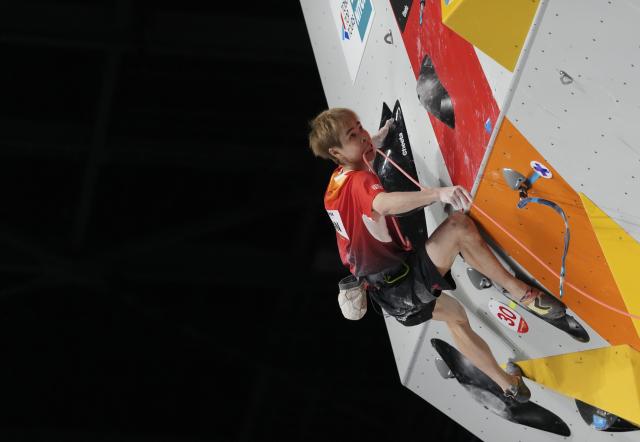 (261003) -- NAGOYA, Oct. 3, 2026 (Xinhua) -- Pan Yufei of China competes during the men's lead final of sport climbing at 20th Asian Games Aichi-Nagoya 2026 in Nagoya, Japan, Oct. 3, 2026. (Xinhua/Zhou Mi)