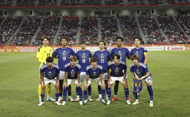 (261003) -- TOYOTA, Oct. 3, 2026 (Xinhua) -- Starting players of Japan line up before the men's final match of football between South Korea and Japan at 20th Asian Games Aichi-Nagoya 2026 in Toyota of Aichi Prefecture, Japan, Oct. 3, 2026. (Xinhua/Jia Haocheng)