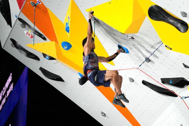 (261003) -- NAGOYA, Oct. 3, 2026 (Xinhua) -- Yoshida Satone of Japan competes during the men's lead final of sport climbing at 20th Asian Games Aichi-Nagoya 2026 in Nagoya, Japan, Oct. 3, 2026. (Xinhua/Zhou Mi)