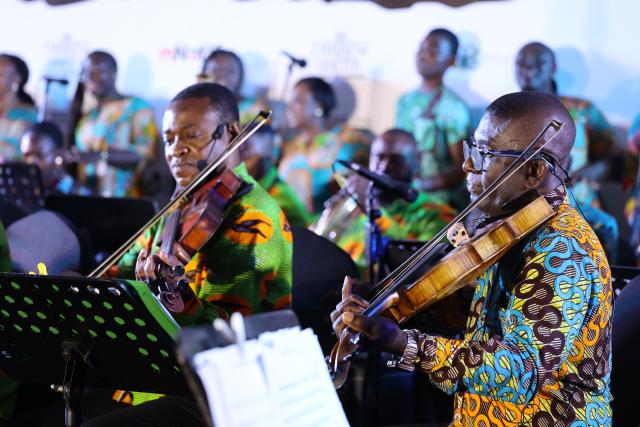 (261003) -- ACCRA, Oct. 3, 2026 (Xinhua) -- Members of Ghana's National Symphony Orchestra perform during the celebration of 2026 Theater Festival in Accra, Ghana, Oct. 1, 2026.
  On Thursday night, the performance of Ghana's National Symphony Orchestra wowed audience who converged at the forecourt of the National Theater, built for the West African nation from 1990 to 1992 under a China Aid project. 
  TO GO WITH "Ghana National Symphony Orchestra dazzles audience to mark 2026 Theater Festival" (Photo by Seth/Xinhua)