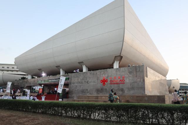 (261003) -- ACCRA, Oct. 3, 2026 (Xinhua) -- This photo shows the National Theater of Ghana in Accra, Ghana, Oct. 1, 2026.
  On Thursday night, the performance of Ghana's National Symphony Orchestra wowed audience who converged at the forecourt of the National Theater, built for the West African nation from 1990 to 1992 under a China Aid project. 
  TO GO WITH "Ghana National Symphony Orchestra dazzles audience to mark 2026 Theater Festival" (Photo by Seth/Xinhua)
