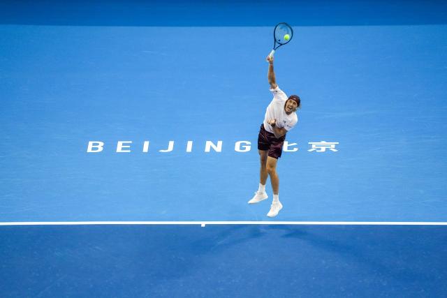 (261003) -- BEIJING, Oct. 3, 2026 (Xinhua) -- Alexander Zverev of Germany serves to Shang Juncheng of China during the men's singles second round match at 2026 China Open tennis tournament in Beijing, China, Oct. 3, 2026. (Xinhua/Xie Han)