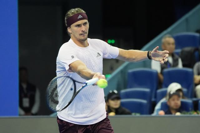 (261003) -- BEIJING, Oct. 3, 2026 (Xinhua) -- Alexander Zverev of Germany hits a return to Shang Juncheng of China during the men's singles second round match at 2026 China Open tennis tournament in Beijing, China, Oct. 3, 2026. (Xinhua/Xie Han)
