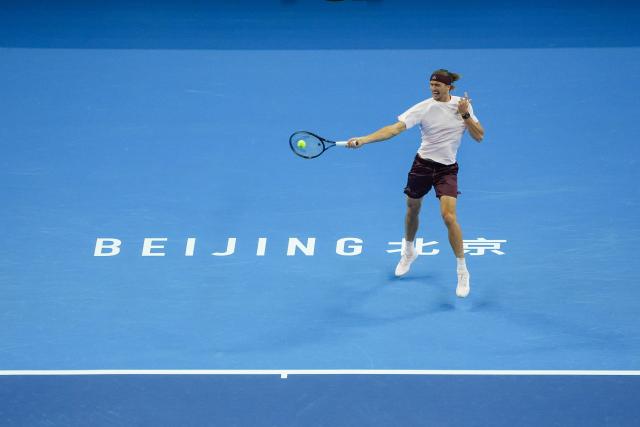 (261003) -- BEIJING, Oct. 3, 2026 (Xinhua) -- Alexander Zverev of Germany hits a return to Shang Juncheng of China during the men's singles second round match at 2026 China Open tennis tournament in Beijing, China, Oct. 3, 2026. (Xinhua/Xie Han)