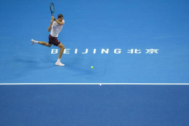 (261003) -- BEIJING, Oct. 3, 2026 (Xinhua) -- Alexander Zverev of Germany hits a return to Shang Juncheng of China during the men's singles second round match at 2026 China Open tennis tournament in Beijing, China, Oct. 3, 2026. (Xinhua/Xie Han)