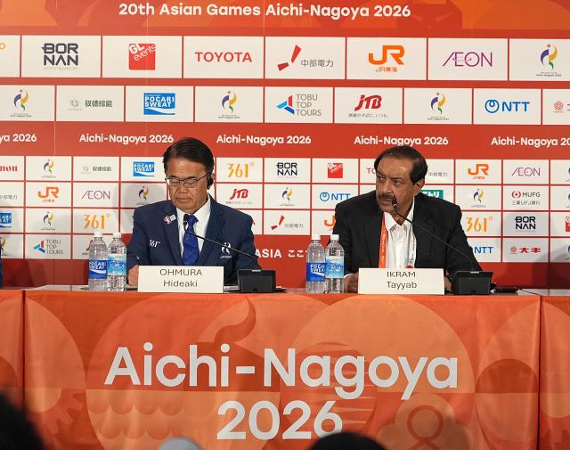 (261004) -- NAGOYA, Oct. 4, 2026 (Xinhua) -- Ohmura Hideaki (L), President of the Aichi-Nagoya Asian Games and Asian Para Games Organizing Committee, and Mohammad Tayyab Ikram, chairman of the Aichi-Nagoya 2026 Asian Games Coordination Committee, react during a theme briefing of the Aichi-Nagoya 2026 Asian Games Organizing Committee(AINAGOC) in Nagoya, Japan, Oct. 4, 2026. (Xinhua/Hou Zhaokang)