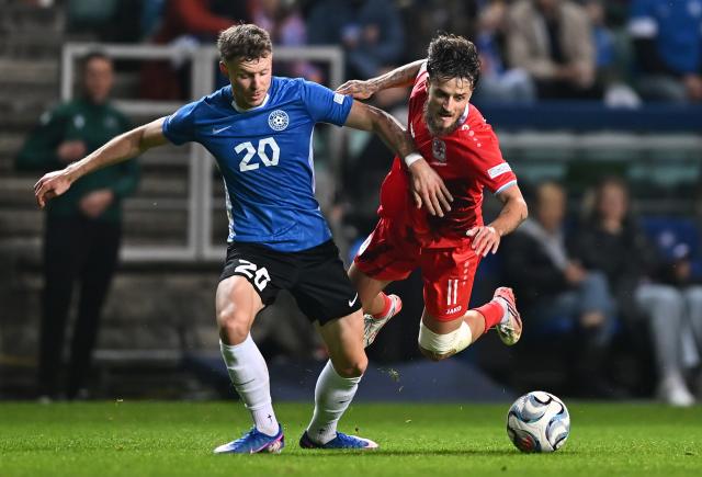 (261004) -- TALLINN, Oct. 4, 2026 (Xinhua) -- Estonia's Markus Poom (L) challenges Luxembourg's Vicent Thill during the 2026/27 UEFA Nations League C Group C4 football match between Estonia and Luxembourg at A. Le Coq Arena in Tallinn, Estonia, Oct. 3, 2026. (Photo by Sergei Stepanov/Xinhua)