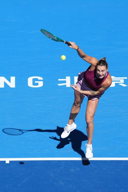 (261004) -- BEIJING, Oct. 4, 2026 (Xinhua) -- Aryna Sabalenka serves during the women's singles round of 32 match between Aryna Sabalenka of Belarus and Nikola Bartunkova of the Czech Republic at 2026 China Open tennis tournament in Beijing, China, Oct. 4, 2026. (Xinhua/Ju Huanzong)