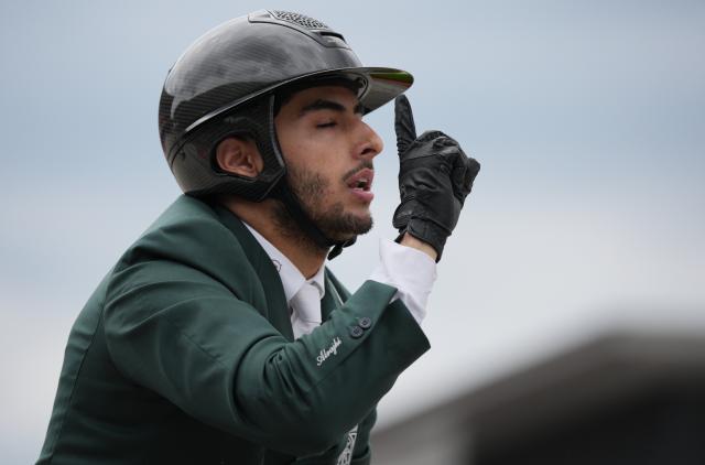 (261004) -- TOKYO, Oct. 4, 2026 (Xinhua) -- Abdulrahman Bader M Alrajhi of Saudi Arabia riding Lorenzo ES reacts during the jumping Ind B (up to 1.55m) 2nd round of equestrian at the 20th Asian Games Aichi-Nagoya 2026 in Tokyo, Japan, Oct. 4, 2026. (Photo by Wang Shen/Xinhua)