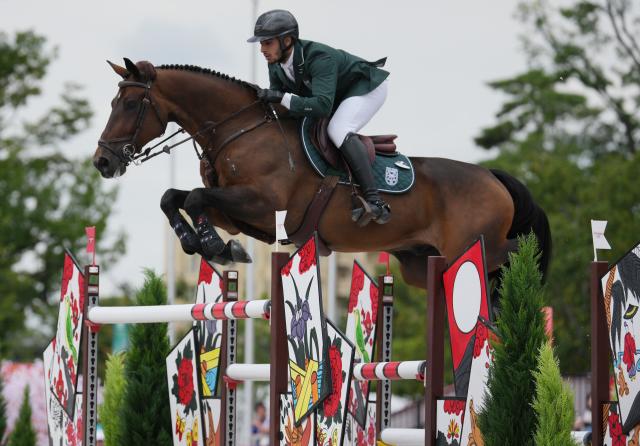 (261004) -- TOKYO, Oct. 4, 2026 (Xinhua) -- Abdulrahman Bader M Alrajhi of Saudi Arabia riding Lorenzo ES competes during the jumping Ind B (up to 1.55m) 2nd round of equestrian at the 20th Asian Games Aichi-Nagoya 2026 in Tokyo, Japan, Oct. 4, 2026. (Photo by Wang Shen/Xinhua)