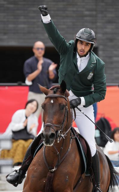 (261004) -- TOKYO, Oct. 4, 2026 (Xinhua) -- Abdulrahman Bader M Alrajhi of Saudi Arabia riding Lorenzo ES reacts during the jumping Ind B (up to 1.55m) 2nd round of equestrian at the 20th Asian Games Aichi-Nagoya 2026 in Tokyo, Japan, Oct. 4, 2026. (Photo by Wang Shen/Xinhua)