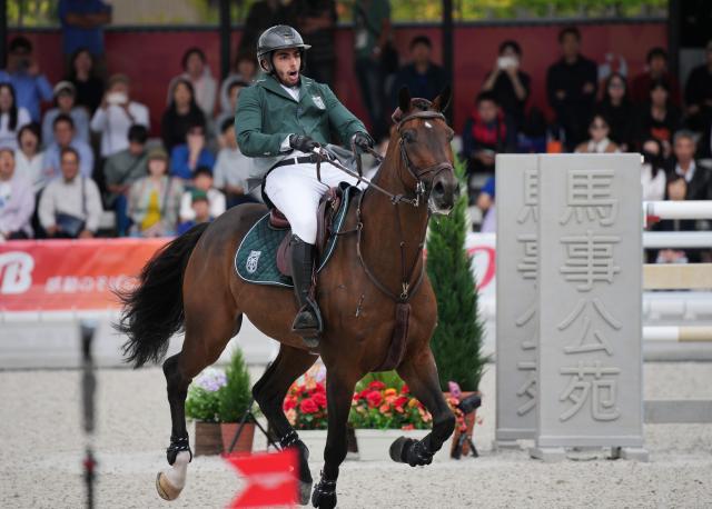 (261004) -- TOKYO, Oct. 4, 2026 (Xinhua) -- Abdulrahman Bader M Alrajhi of Saudi Arabia riding Lorenzo ES competes during the jumping Ind B (up to 1.55m) 2nd round of equestrian at the 20th Asian Games Aichi-Nagoya 2026 in Tokyo, Japan, Oct. 4, 2026. (Photo by Wang Shen/Xinhua)