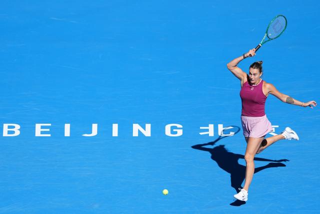 (261004) -- BEIJING, Oct. 4, 2026 (Xinhua) -- Aryna Sabalenka competes during the women's singles third round match between Aryna Sabalenka of Belarus and Nikola Bartunkova of the Czech Republic at 2026 China Open tennis tournament in Beijing, China, Oct. 4, 2026. (Xinhua/Ju Huanzong)